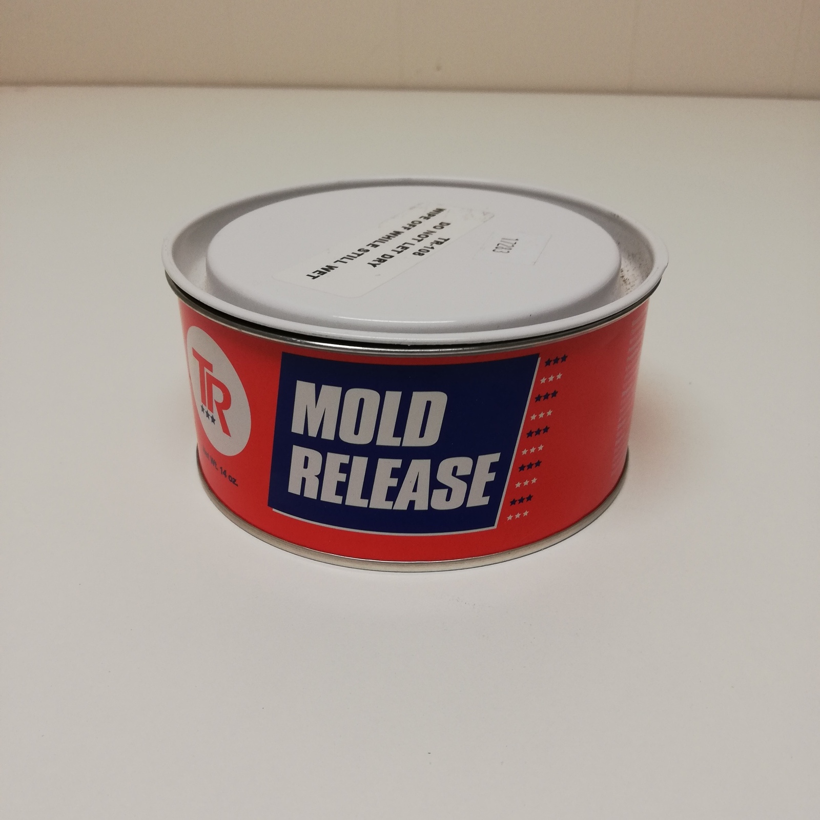 Removing silicone mold release and polysilane oils